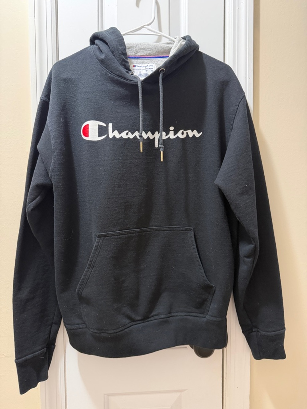 Champion Black Crewneck Hoodie with White Script and Red Emblem